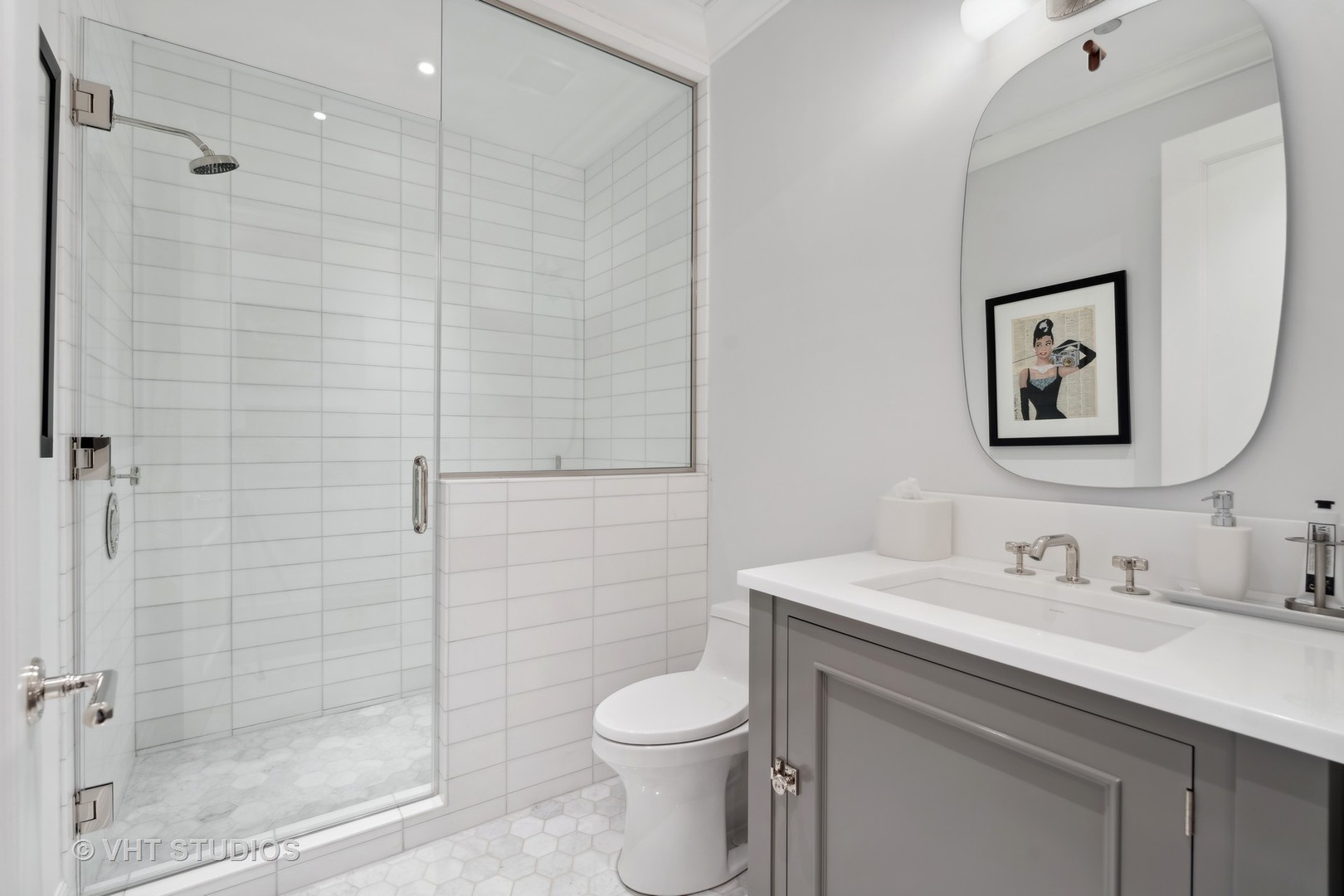 9 West Walton Street, Unit 1901 Chicago, IL 60610 - Photo 46 of 64 a bathroom with a sink toilet and shower