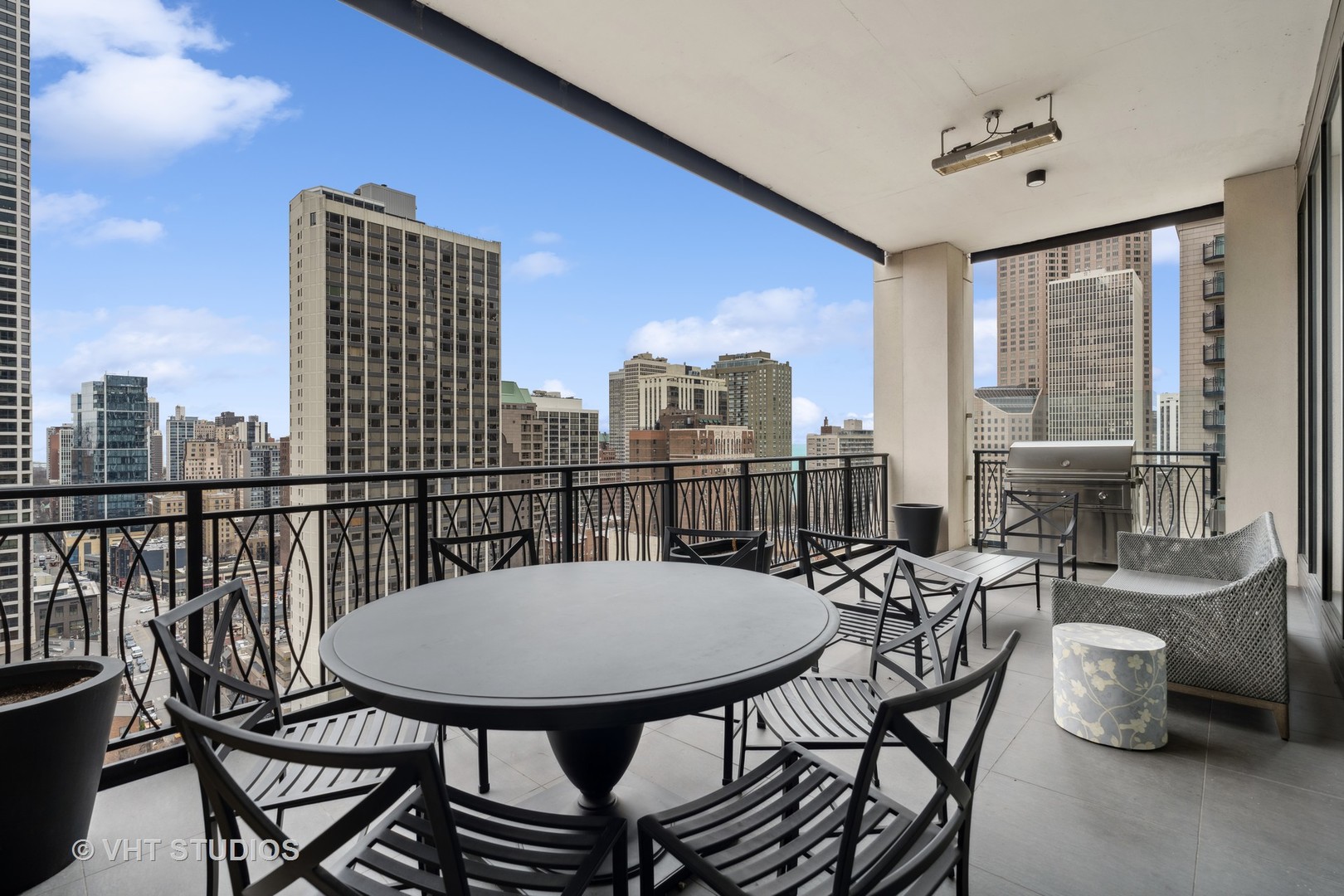 9 West Walton Street, Unit 1901 Chicago, IL 60610 - Photo 48 of 64 a view of a balcony dining table and chairs