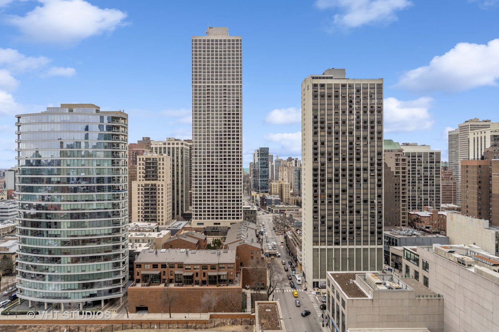 9 West Walton Street, Unit 1901 Chicago, IL 60610 - Photo 52 of 64 a city view with tall buildings