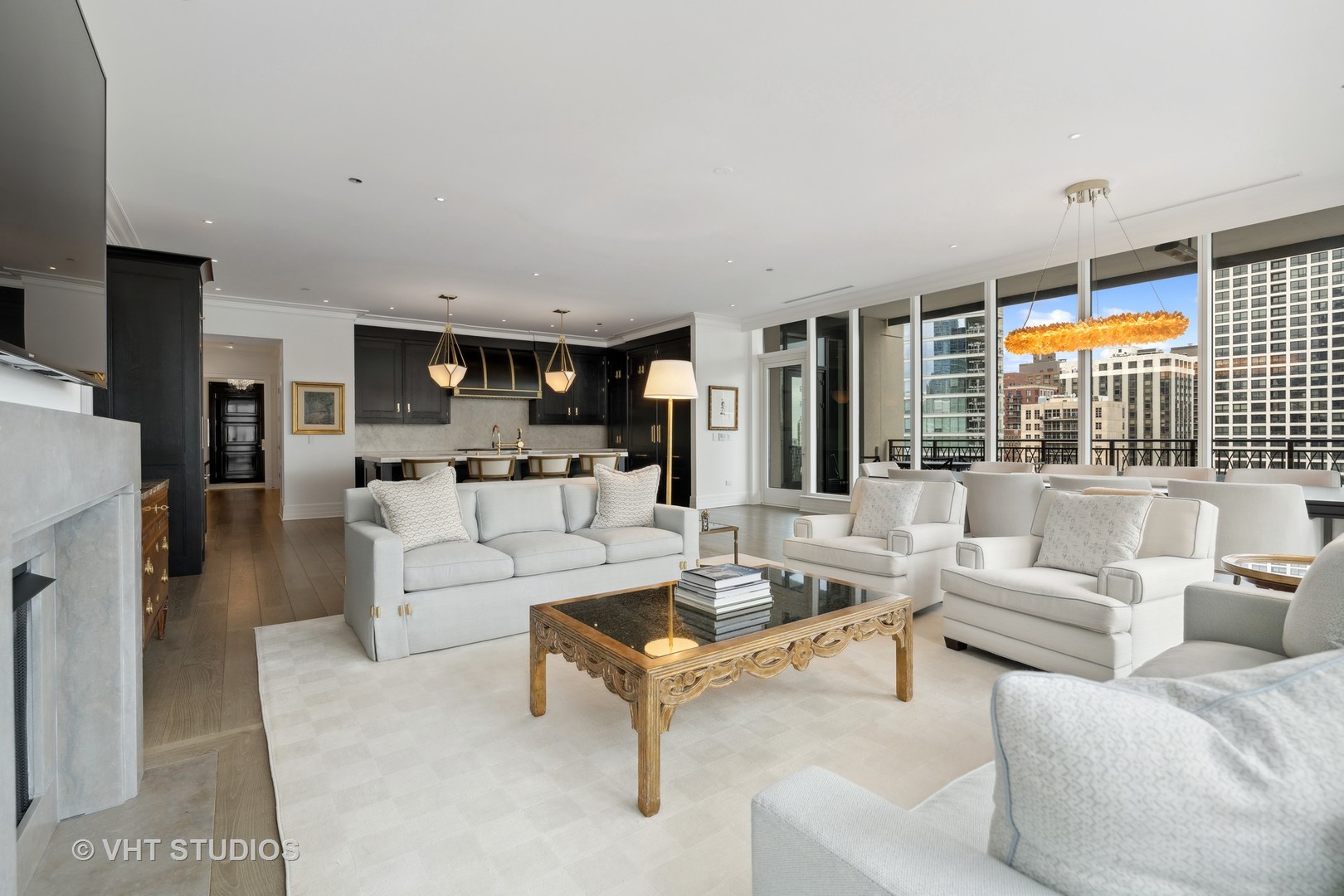 9 West Walton Street, Unit 1901 Chicago, IL 60610 - Photo 9 of 64 a living room with fireplace furniture and a large window