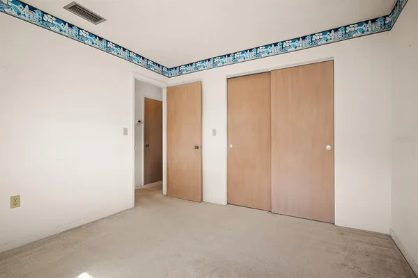 a view of a room with a large window