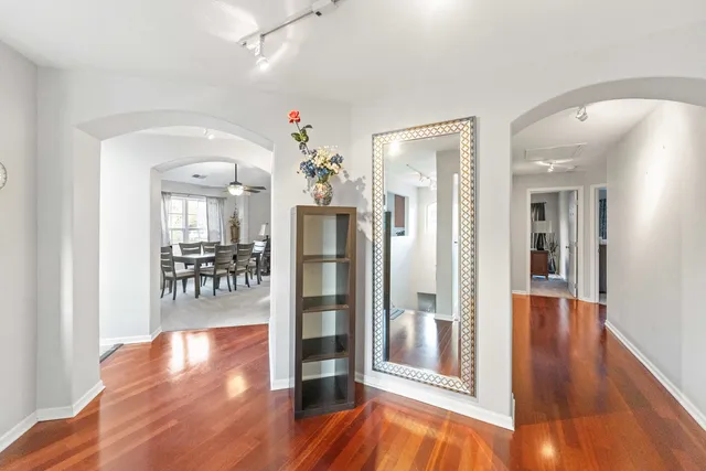 a bedroom with a large bed and a large window