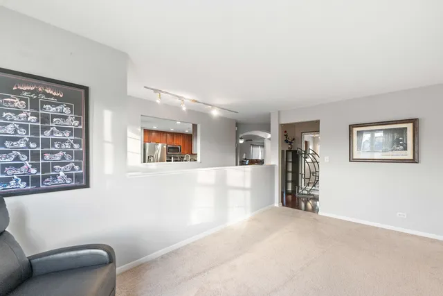 a view of a livingroom with a workspace