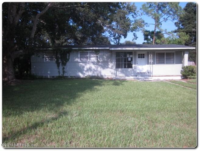 6515 Ector Road Jacksonville, FL 32211 - Photo 1 of 1 front view of a house with a yard