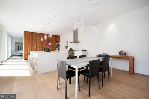 a view of a kitchen from the hallway