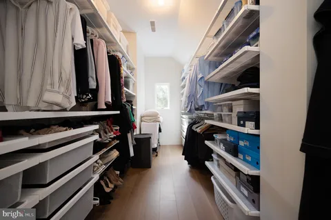 a bedroom with a bed and a view of bathroom