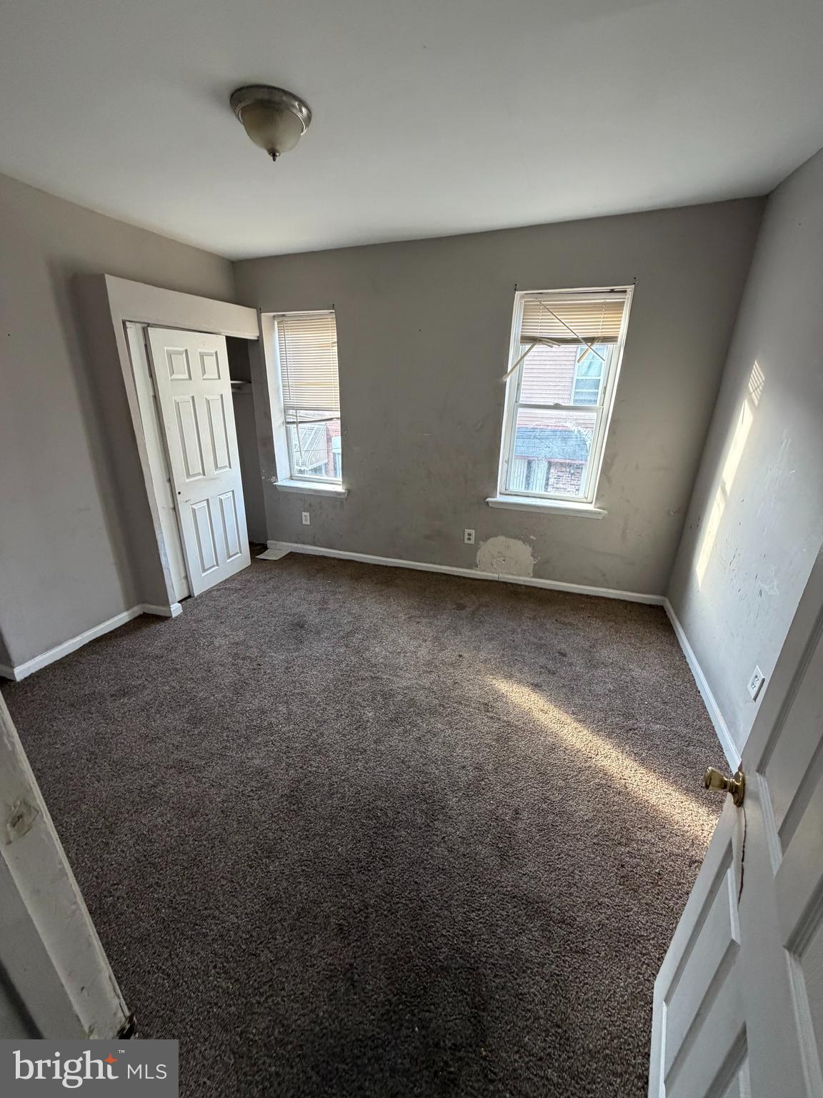 1639 South LeCount Street Philadelphia, PA 19145 - Photo 4 of 9 a view of an empty room with a window