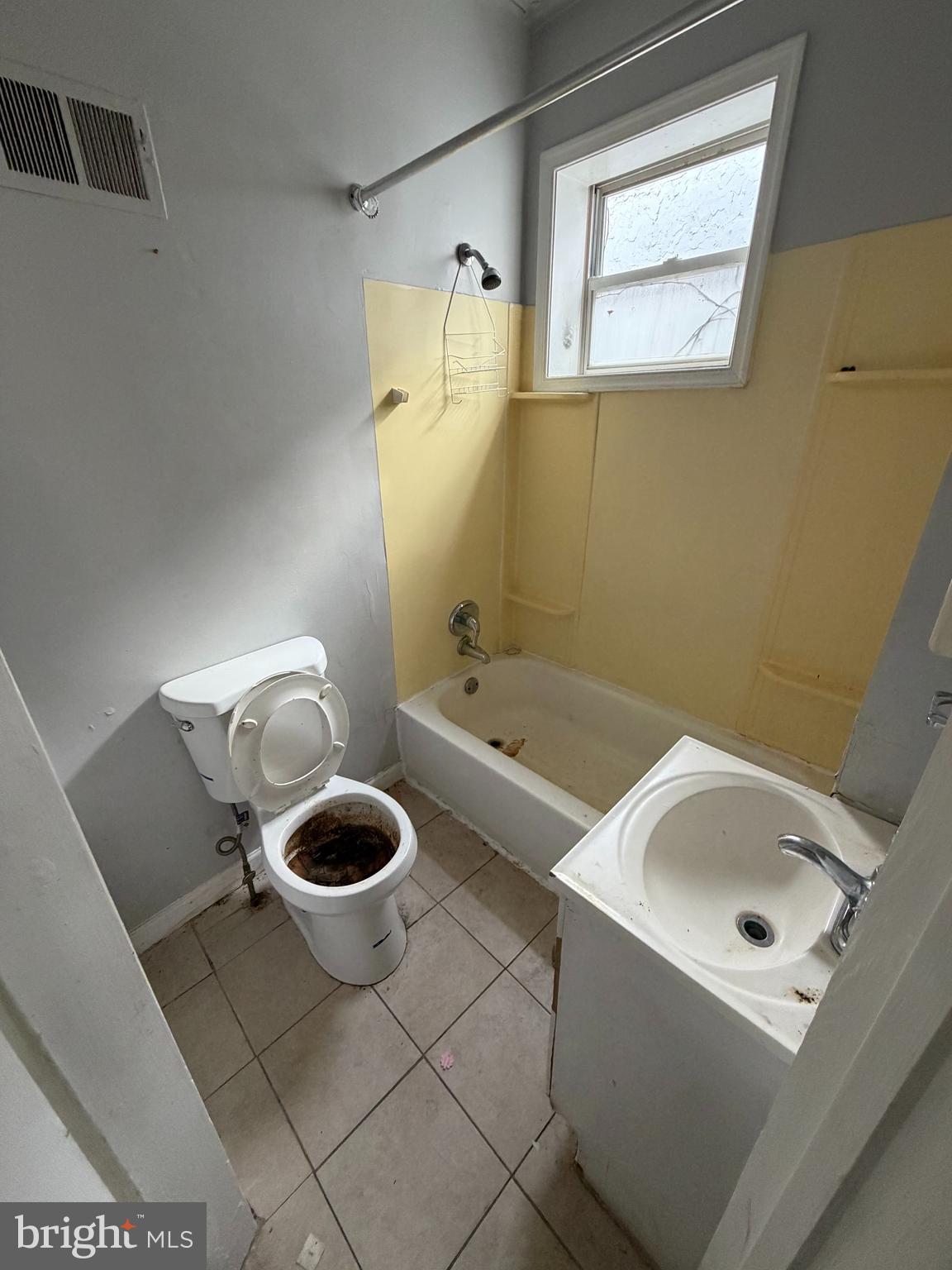 1639 South LeCount Street Philadelphia, PA 19145 - Photo 6 of 9 a bathroom with a sink and a toilet
