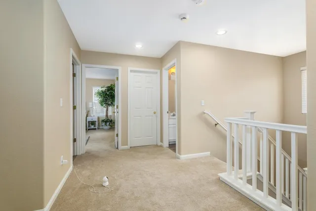 a view of a hallway with closet area