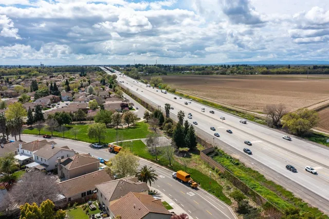 an aerial view of a city with lots of residential buildings
