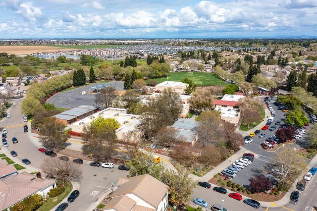 a view of a city with an ocean view