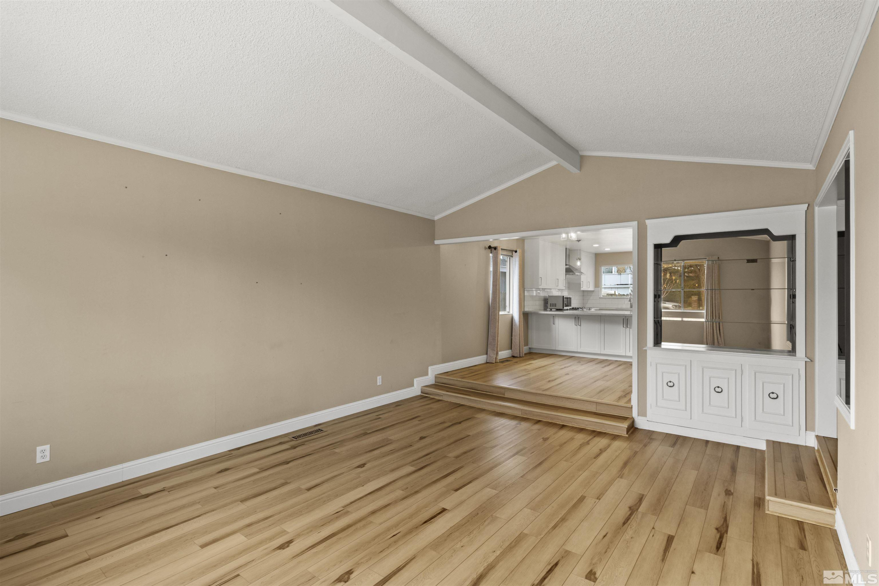 1430 Foster Drive Reno, NV 89509 - Photo 14 of 25 a view of empty room with wooden floor