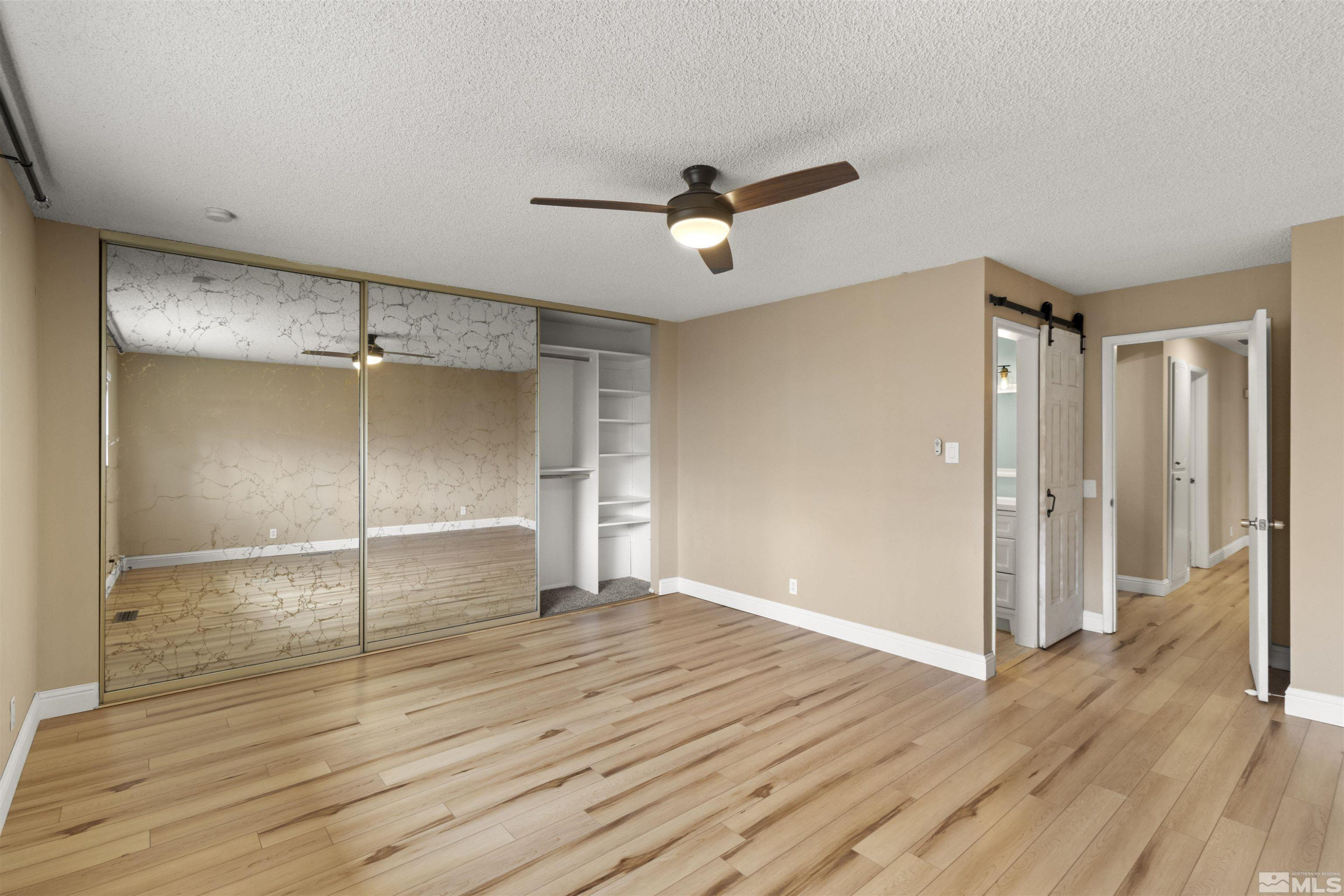 1430 Foster Drive Reno, NV 89509 - Photo 17 of 25 wooden floor in an empty room
