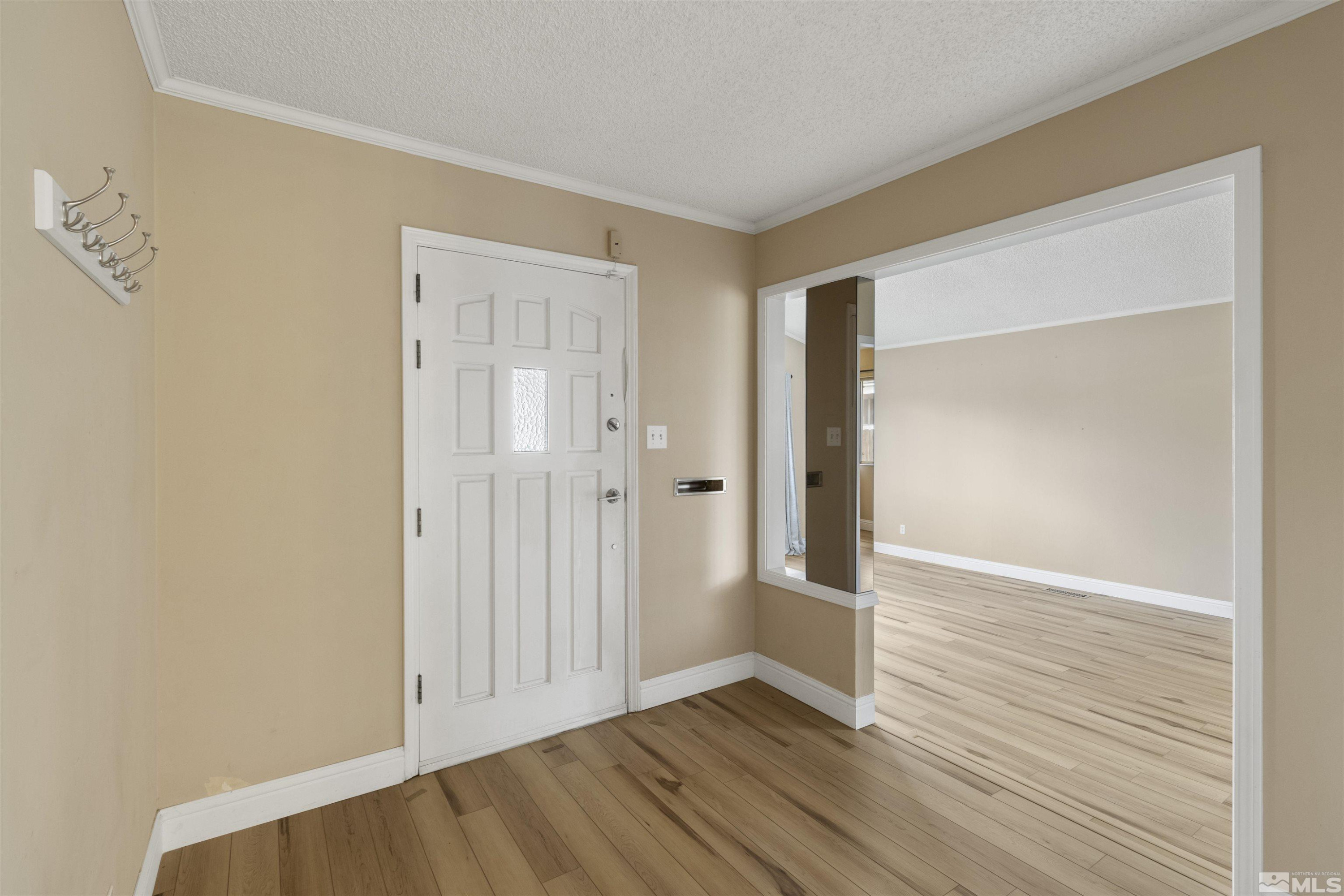 1430 Foster Drive Reno, NV 89509 - Photo 2 of 25 wooden floor in an empty room