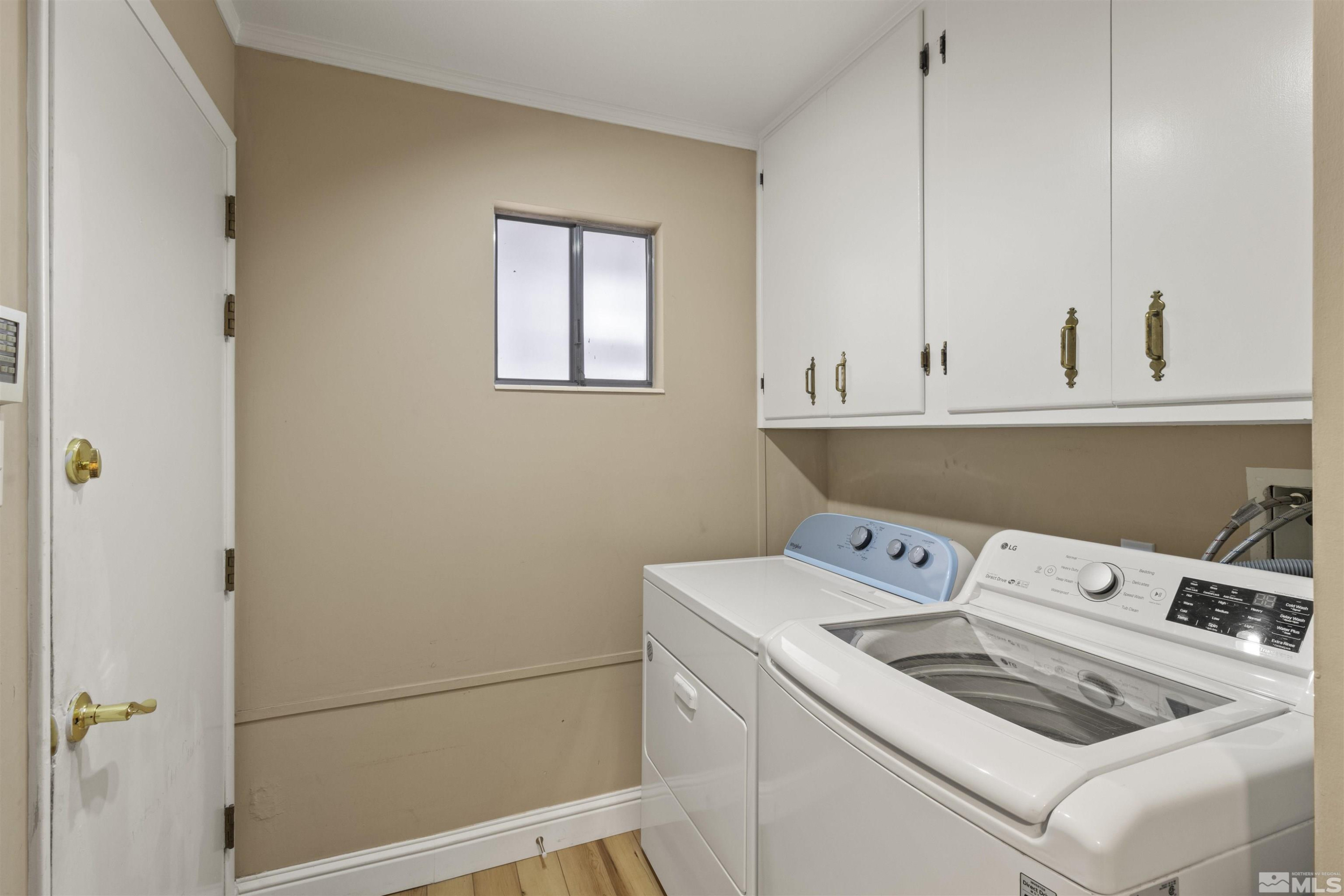 1430 Foster Drive Reno, NV 89509 - Photo 23 of 25 a utility room with dryer and washer