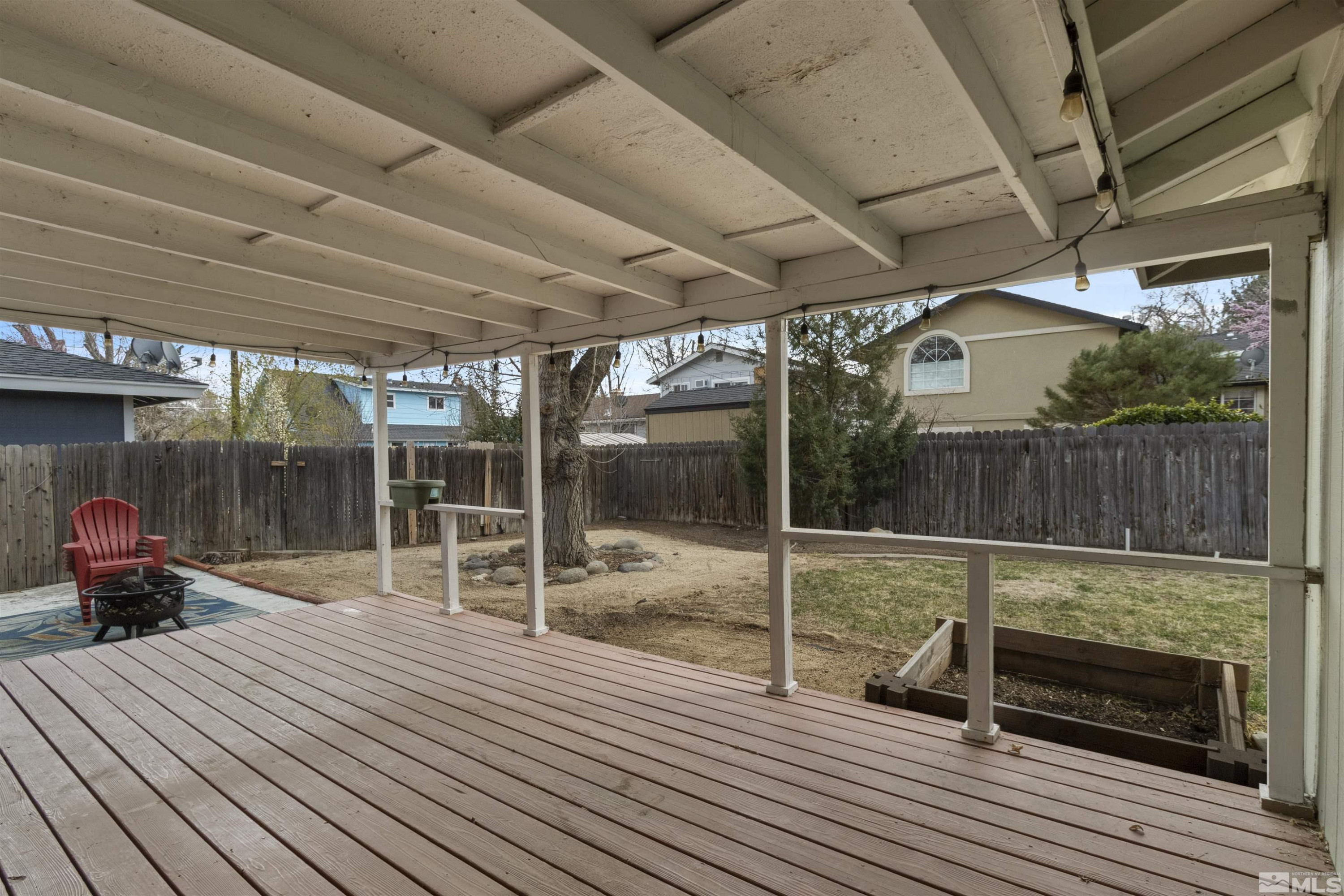 1430 Foster Drive Reno, NV 89509 - Photo 25 of 25 a sitting area with furniture and wooden deck
