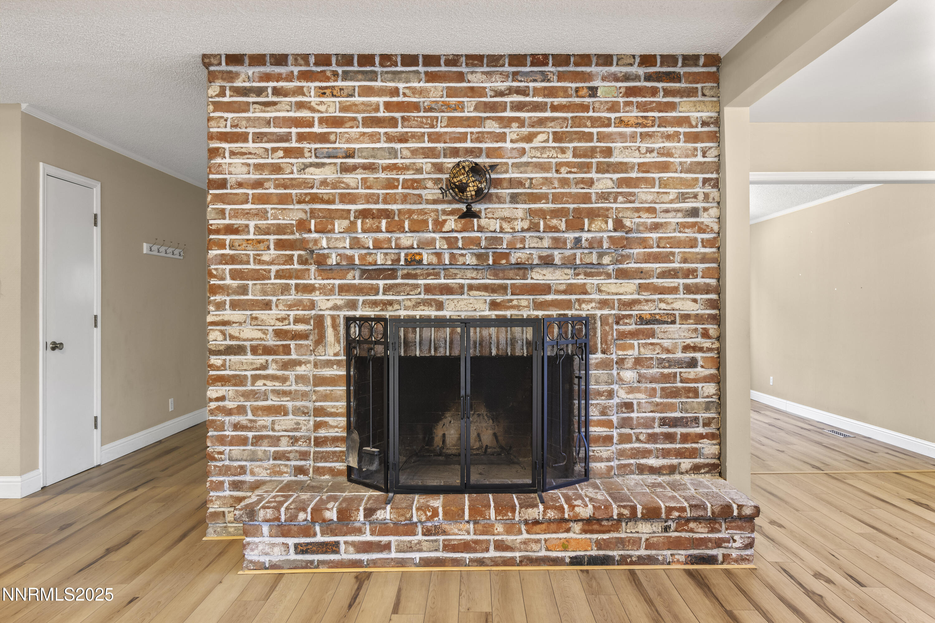 1430 Foster Drive Reno, NV 89509 - Photo 7 of 25 a living room with a fireplace