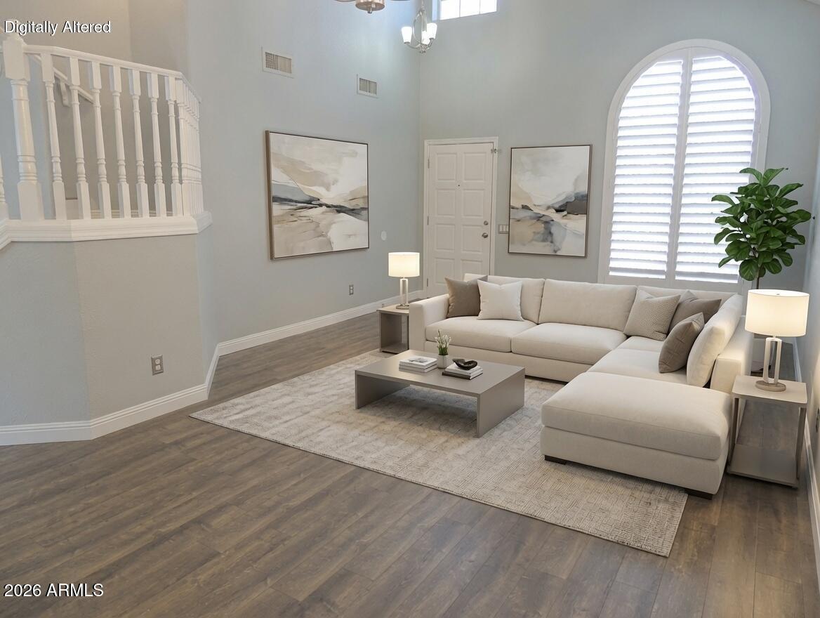4409 East Dry Creek Road Phoenix, AZ 85044 - Photo 14 of 34 a living room with furniture and a large window