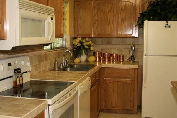 a view of a dining room with furniture and a large window