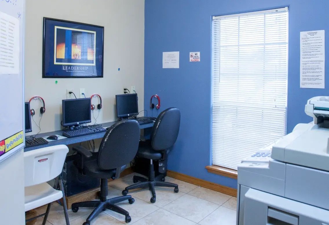 601 South 17th Street Harlingen, TX 78550 - Photo 8 of 11 a view of a workspace with furniture and a window