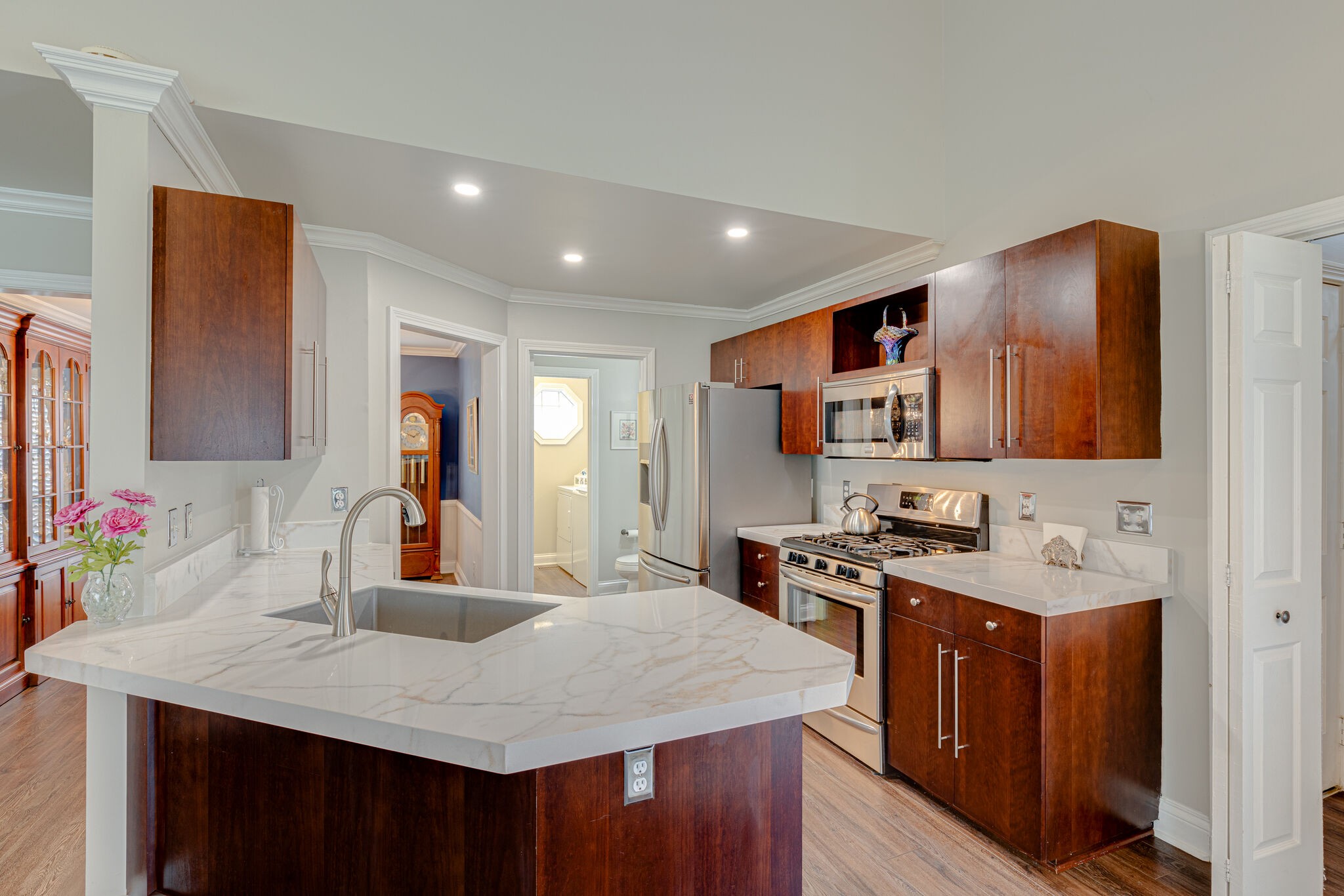 1906 Kent Lane Spring Hill, TN 37174 - Photo 12 of 39 a kitchen with a stove a sink a refrigerator and a refrigerator