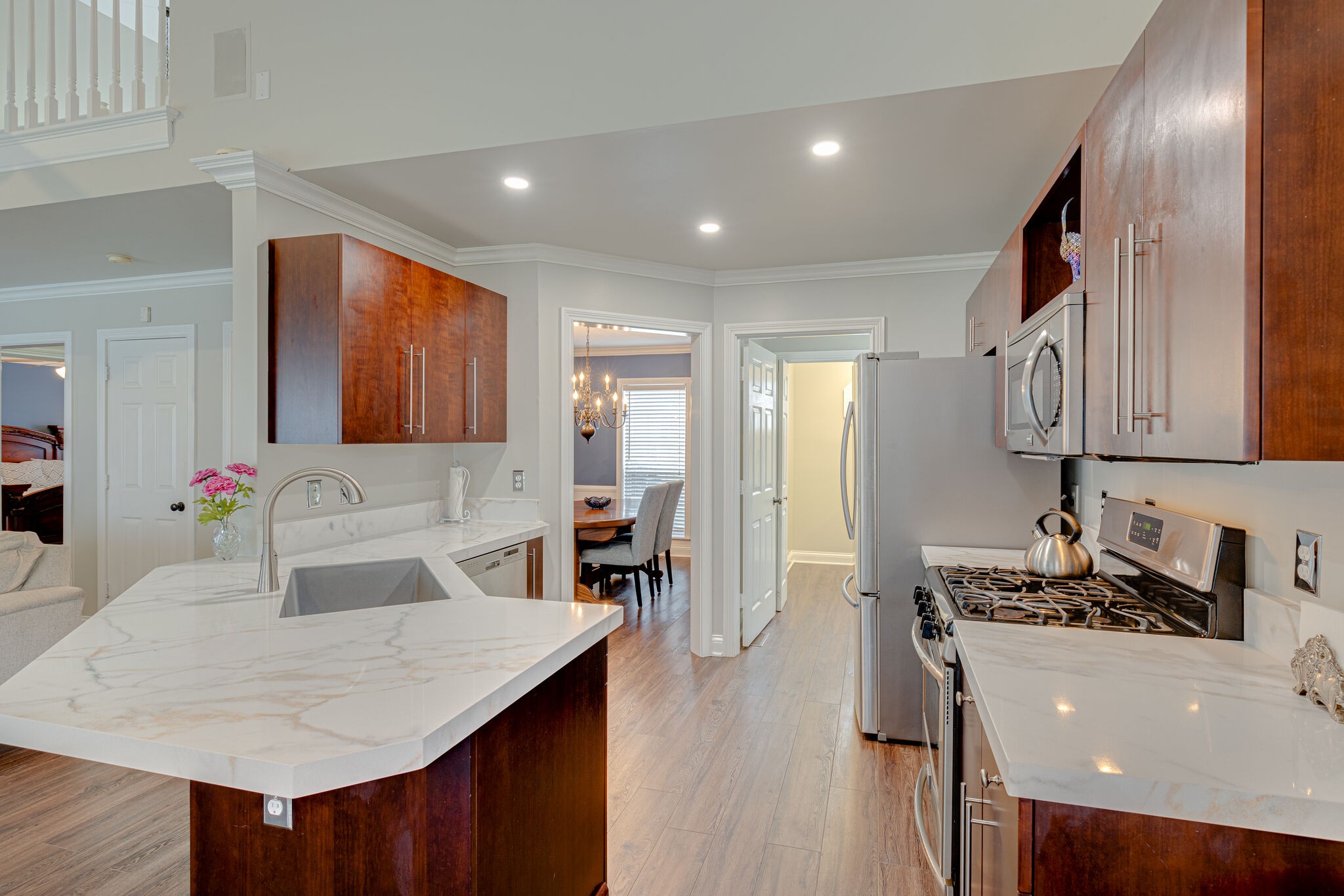 1906 Kent Lane Spring Hill, TN 37174 - Photo 13 of 39 a kitchen with a table chairs sink and cabinets