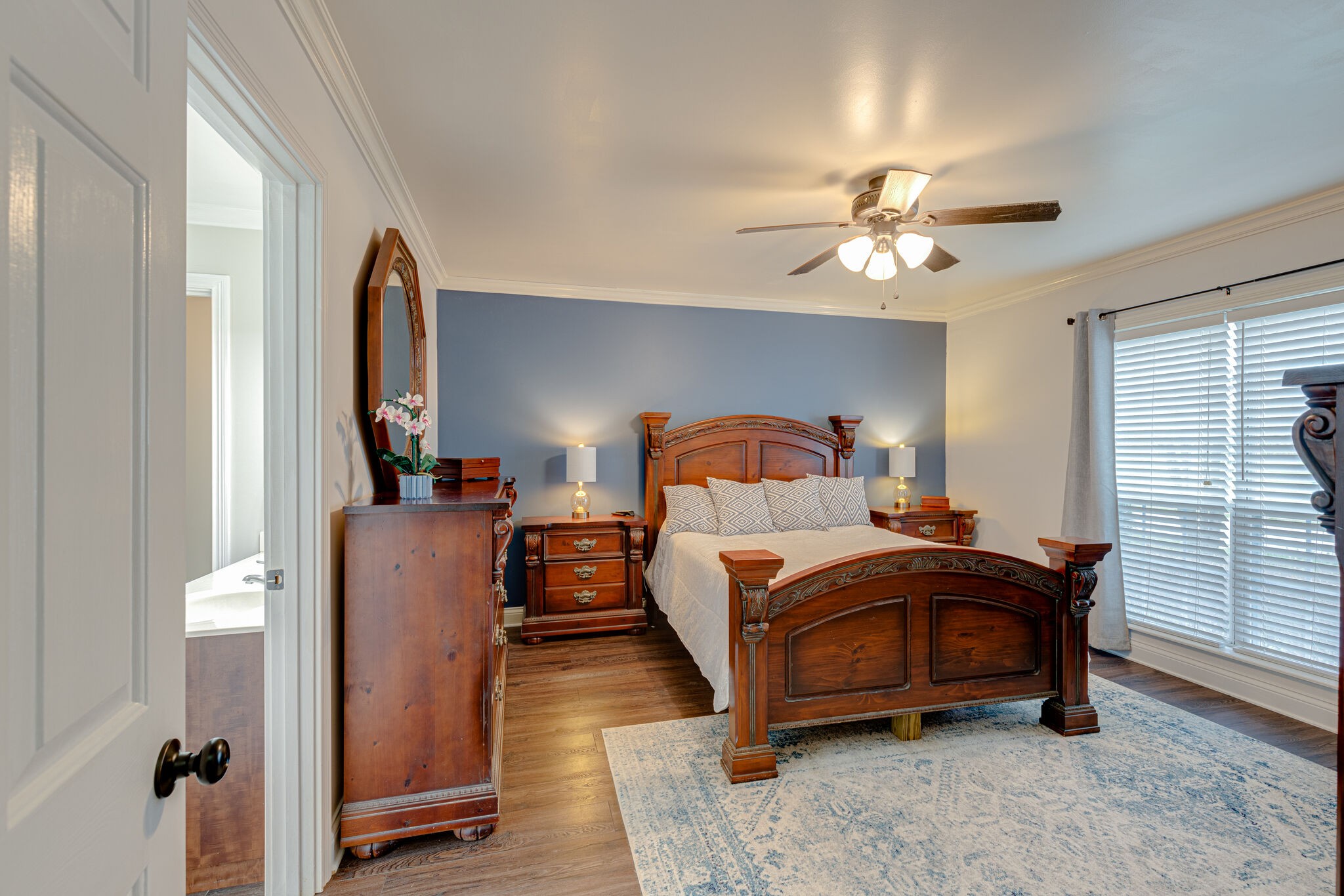 1906 Kent Lane Spring Hill, TN 37174 - Photo 19 of 39 a bedroom with bed and a chandelier