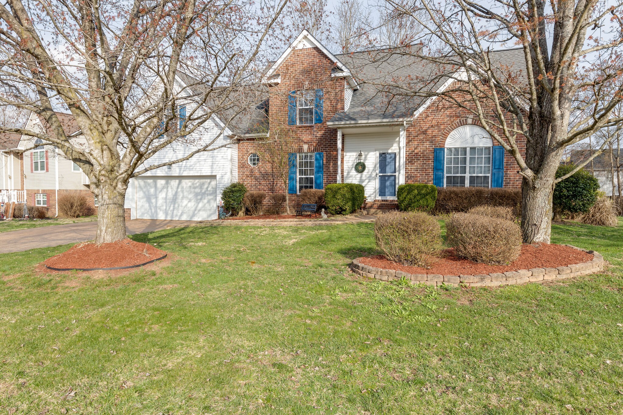 1906 Kent Lane Spring Hill, TN 37174 - Photo 2 of 39 a front view of a house with a yard