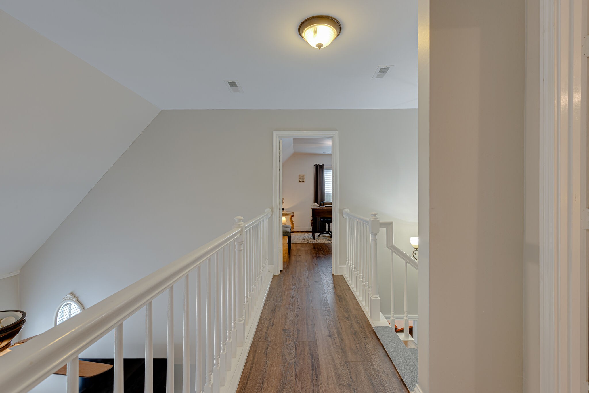 1906 Kent Lane Spring Hill, TN 37174 - Photo 24 of 39 a view of a hallway with wooden floor and staircase
