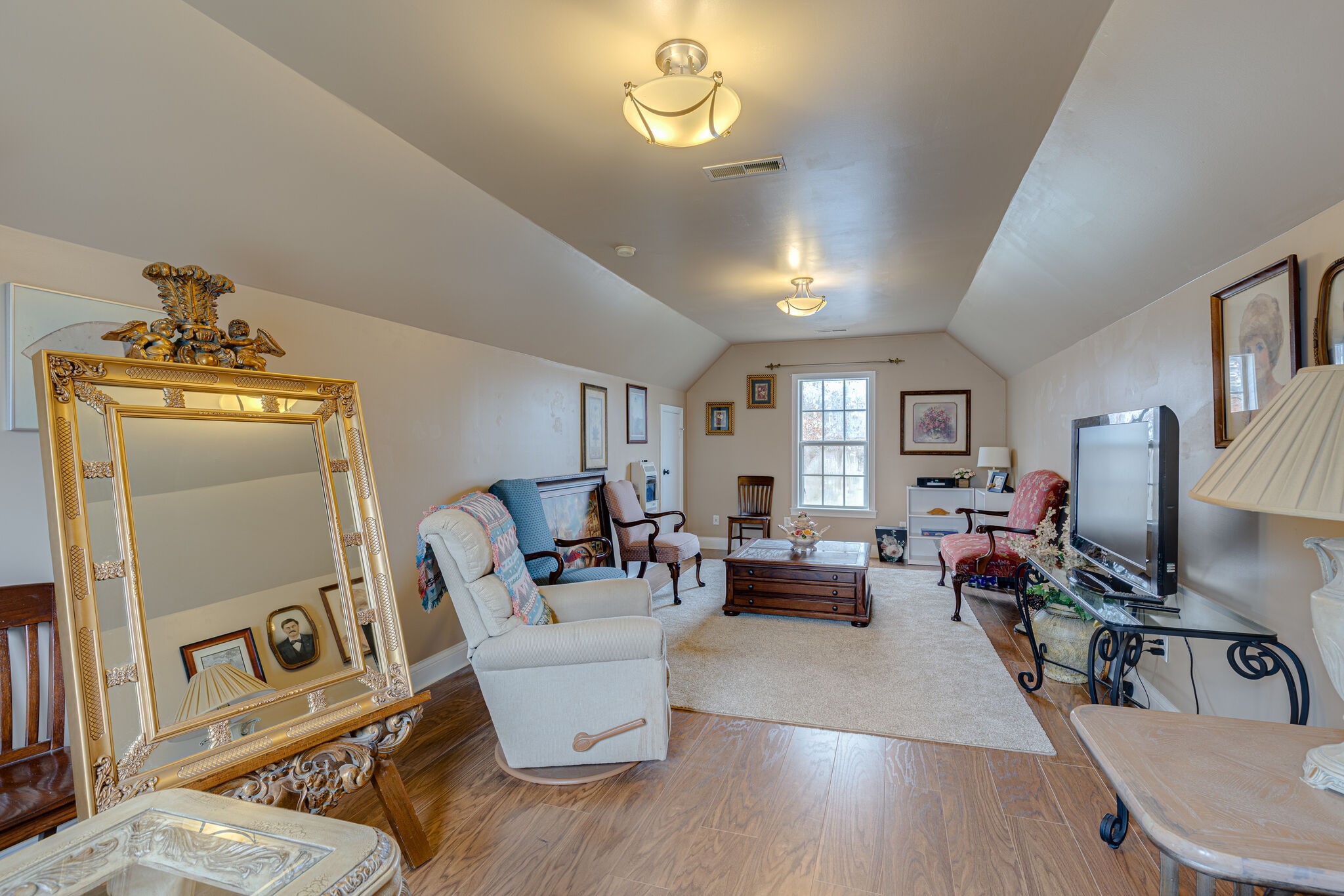 1906 Kent Lane Spring Hill, TN 37174 - Photo 30 of 39 a living room with furniture and a wooden floor