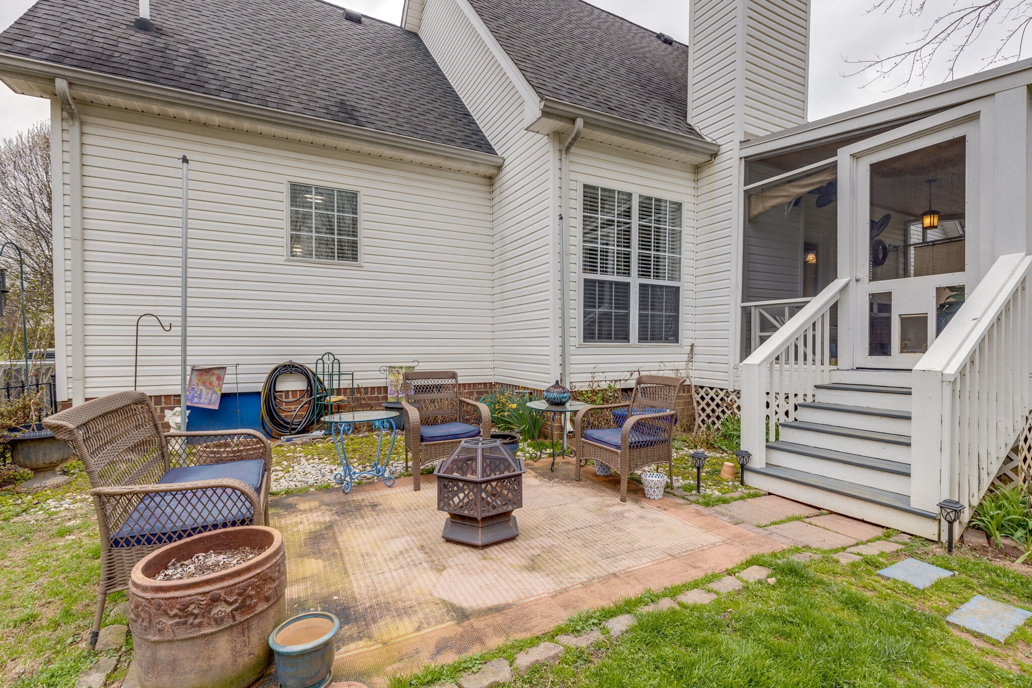 1906 Kent Lane Spring Hill, TN 37174 - Photo 34 of 39 a view of a patio with couches chairs and a potted plant