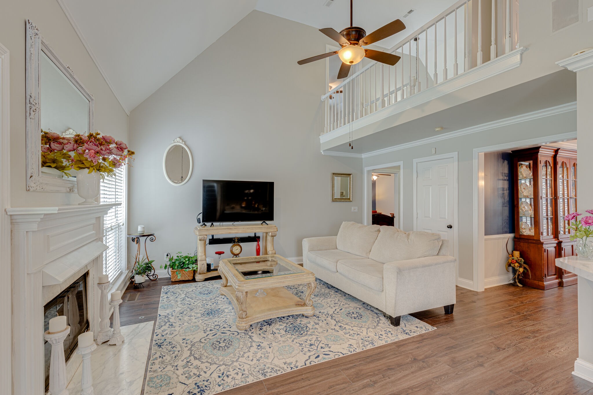 1906 Kent Lane Spring Hill, TN 37174 - Photo 8 of 39 a living room with furniture fireplace and flat screen tv