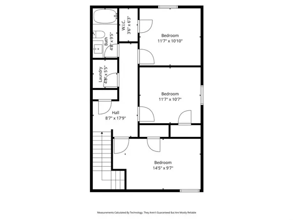 a picture of a bench in front of a wall