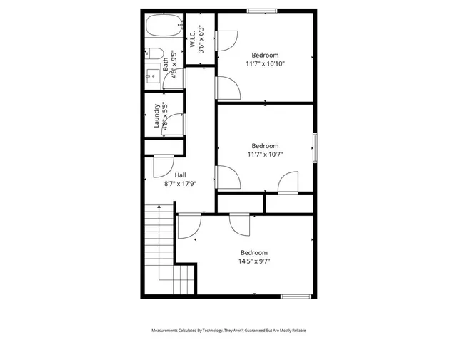 a picture of a bench in front of a wall