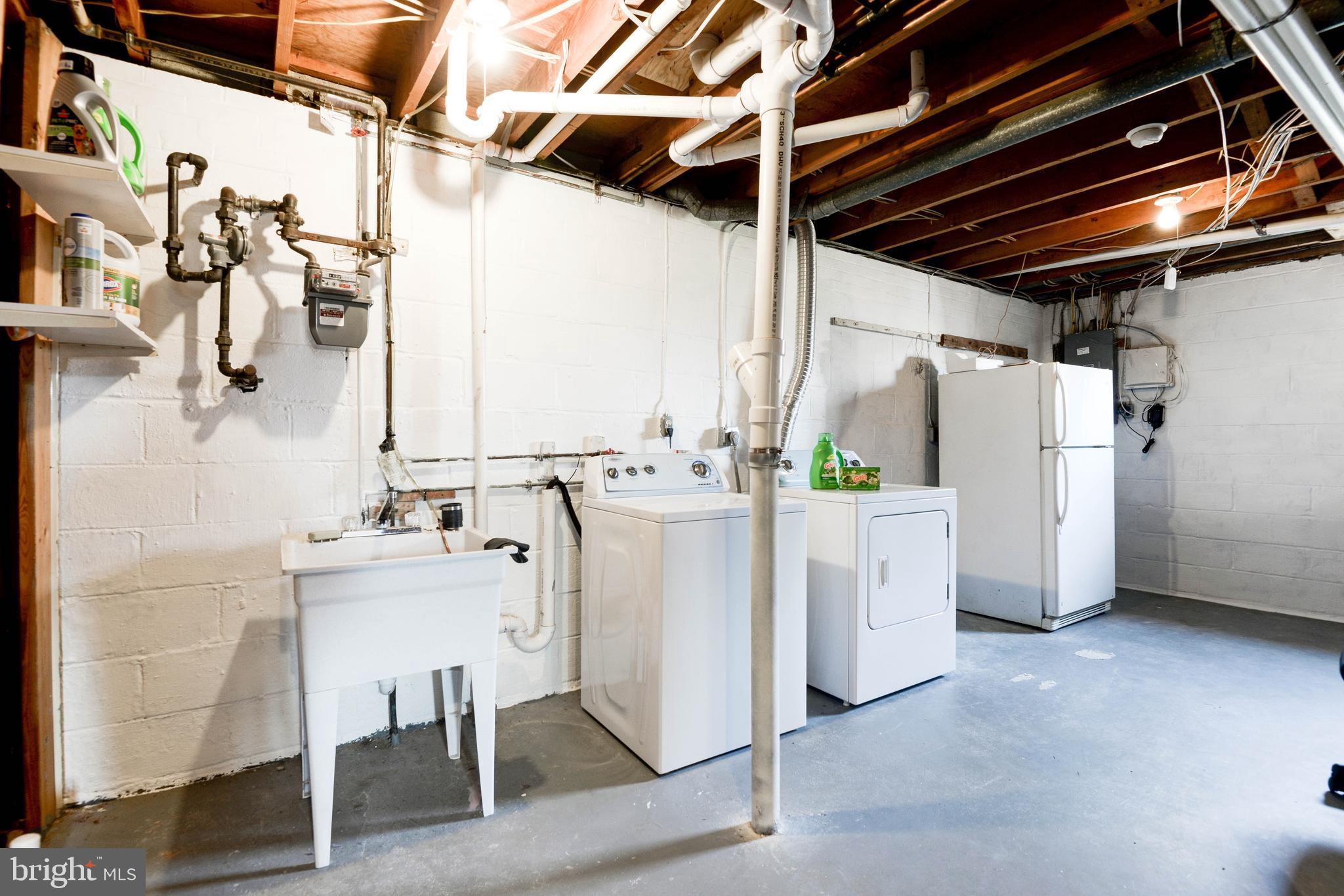 7505 Long Pine Drive Springfield, VA 22151 - Photo 57 of 63 21X15 STORAGE/LAUNDRY; EXTRA FRIDGE & LAUNDRY TUB