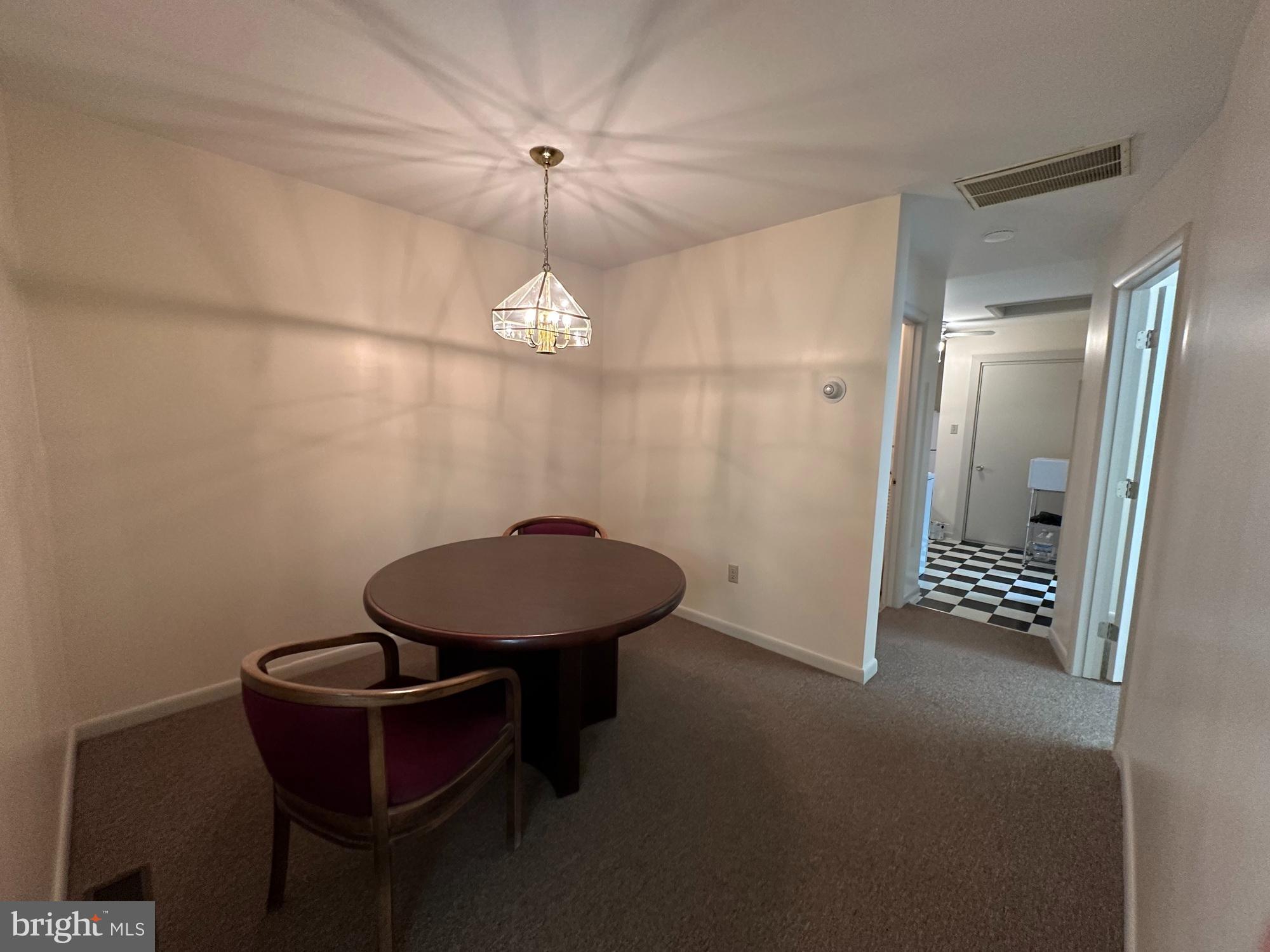 3 Delaware Avenue Delmar, DE 19940 - Photo 4 of 10 a view of a livingroom with a chair and wooden floor
