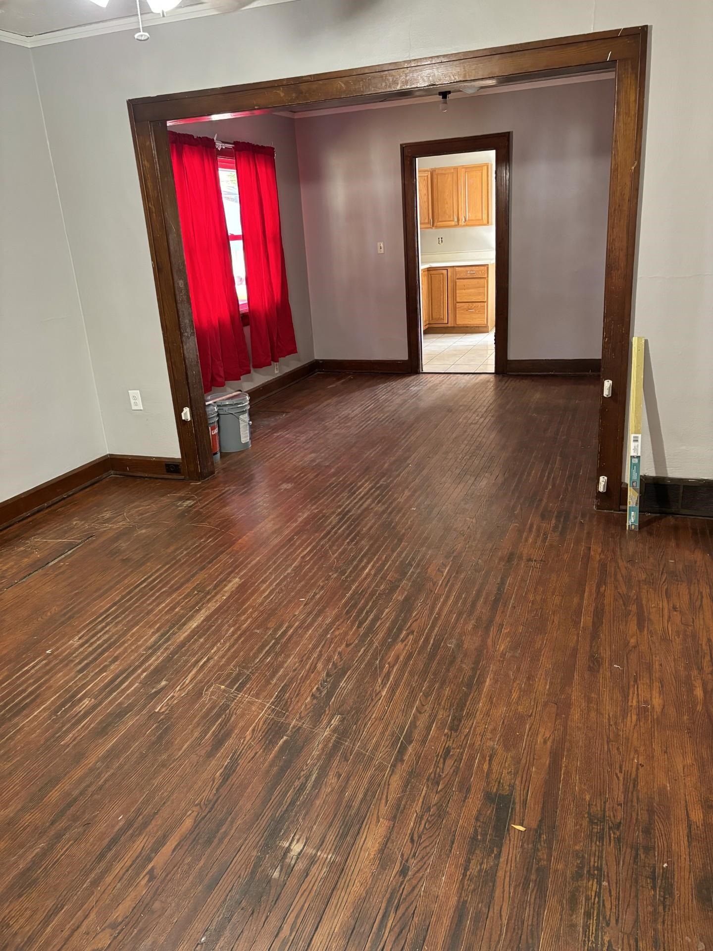 409 Barnum Road Rockford, IL 61109 - Photo 11 of 15 a view of empty room with wooden floor and fan