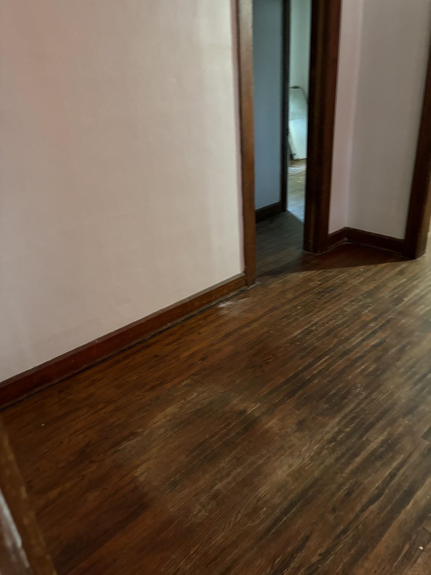 409 Barnum Road Rockford, IL 61109 - Photo 8 of 15 a view of an empty room with wooden floor and a window