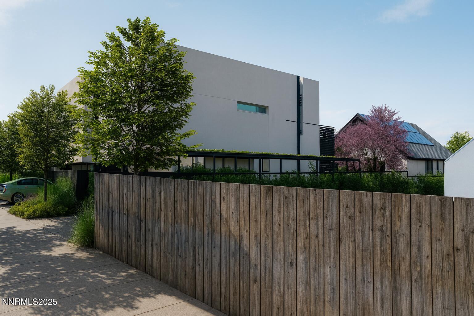 453 Cheney Street Reno, NV 89502 - Photo 15 of 17 a view of a house with a wooden fence