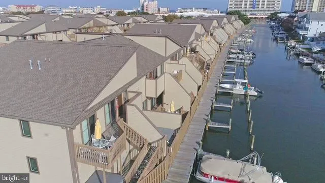 an aerial view of a house with wooden floor