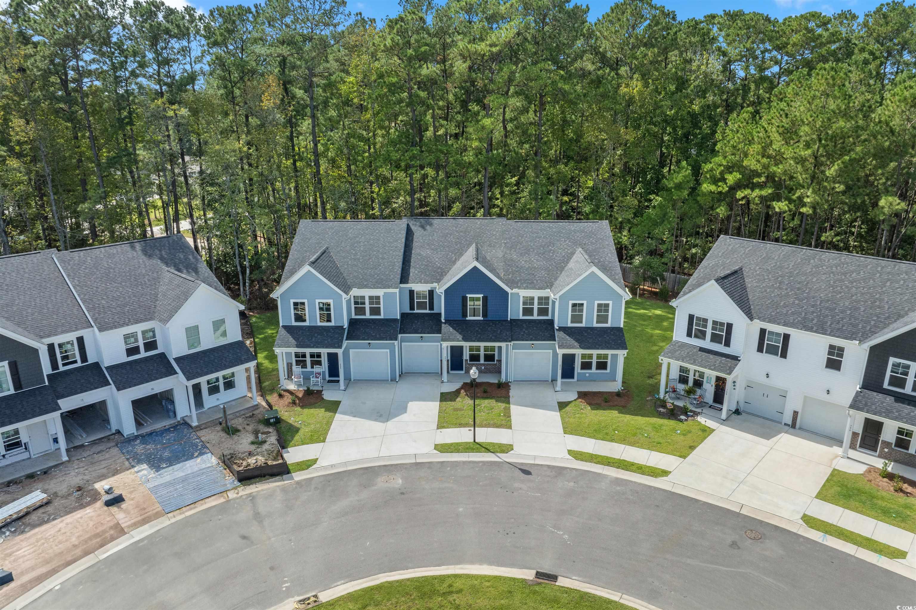 816 Palm Frond Way, Unit 41 Calabash, NC 28467 - Photo 9 of 35 Aerial perspective of suburban area