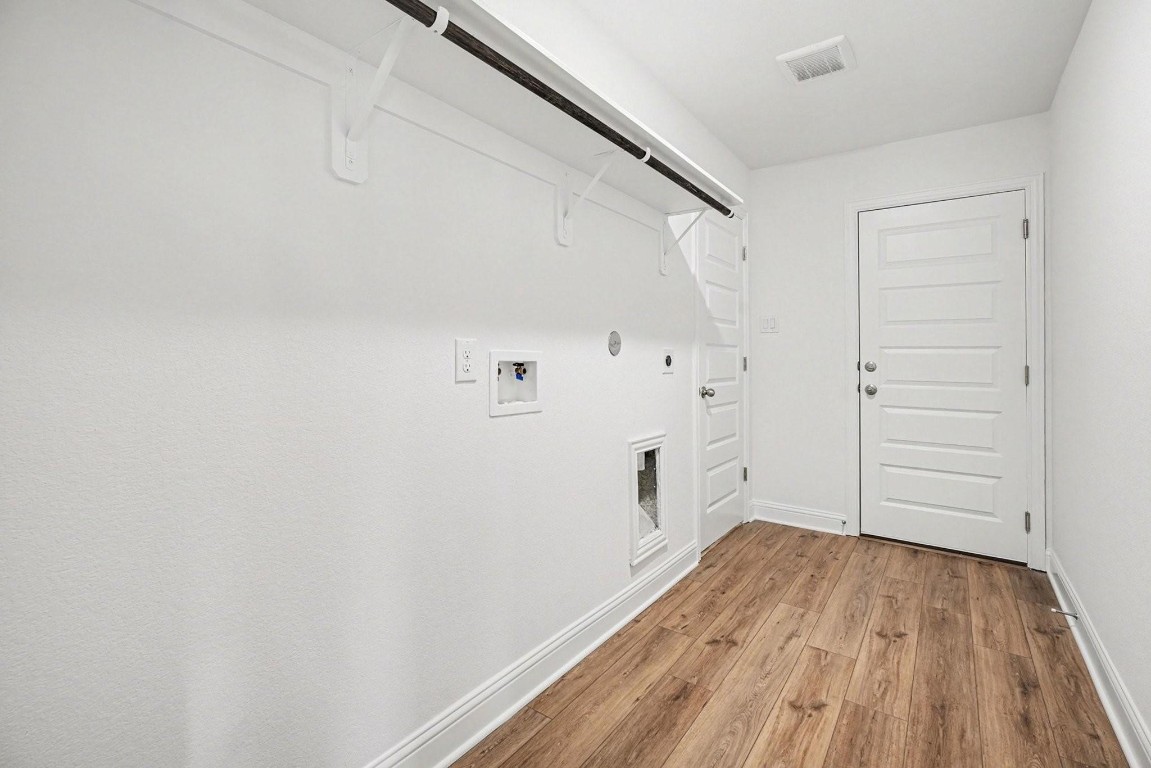 8 Gemstone Court Angleton, TX 77515 - Photo 7 of 7 a view of empty room with wooden floor