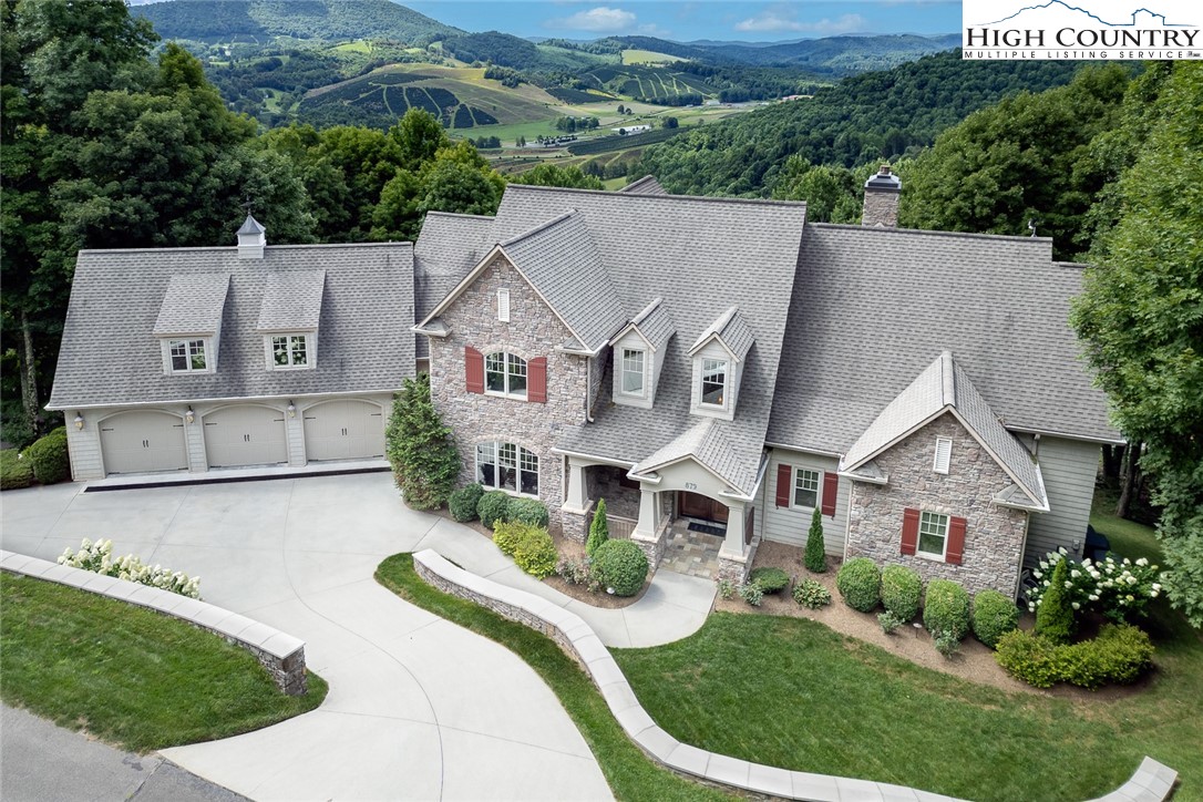 879 Winding Ridge Drive West Jefferson, NC 28694 - Photo 2 of 37 an aerial view of a house