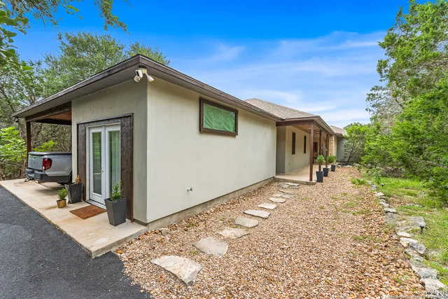 a backyard of a house with seating space