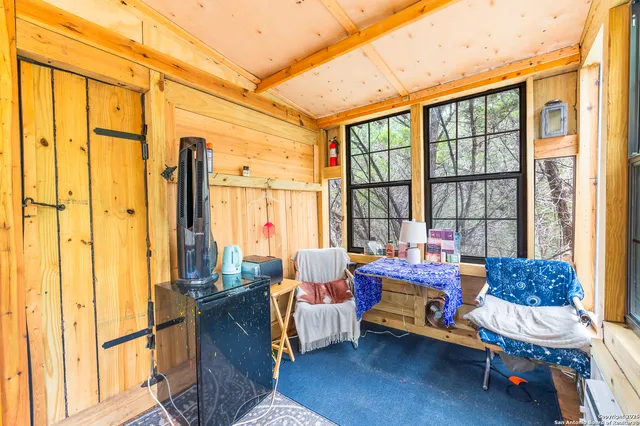 a view of a lake with a yard