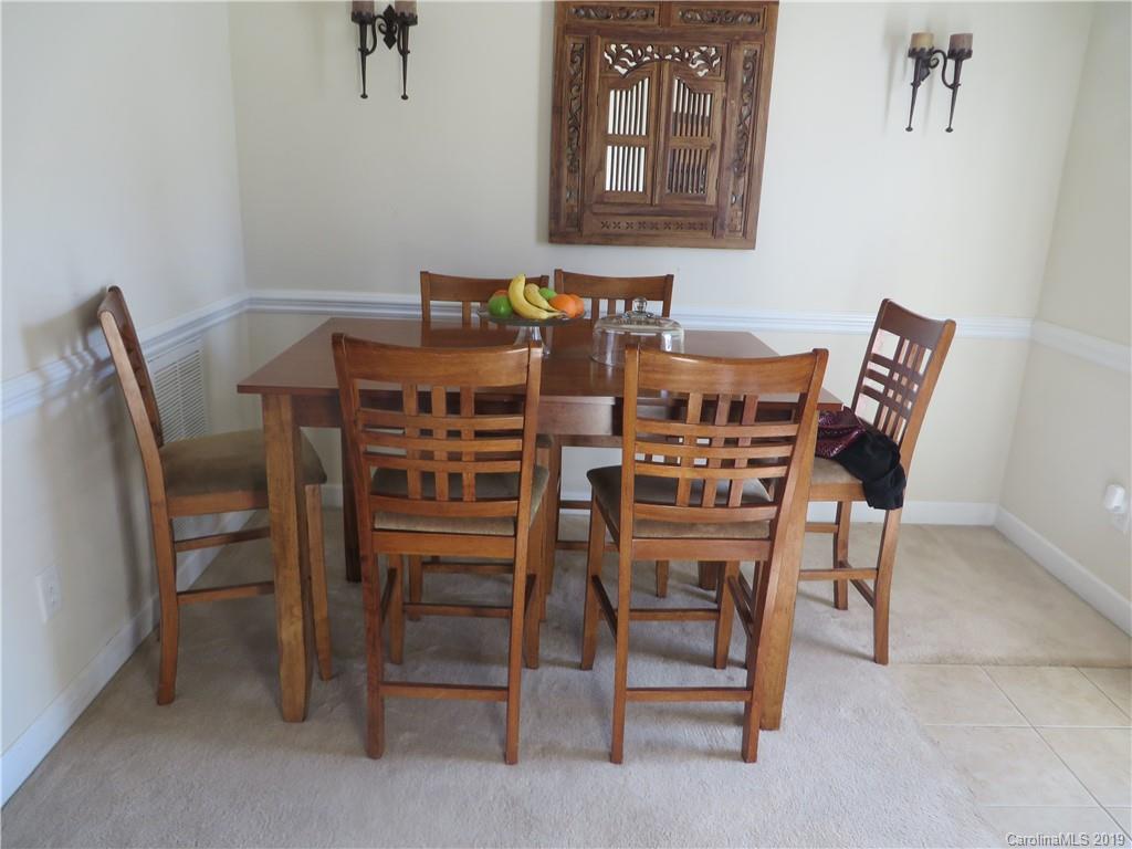 12315 Cross Meadow Road Huntersville, NC 28078 - Photo 4 of 12 a view of a dining room with furniture