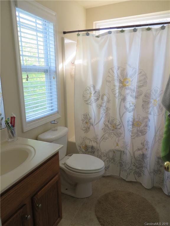 12315 Cross Meadow Road Huntersville, NC 28078 - Photo 7 of 12 a bathroom with a sink and a mirror