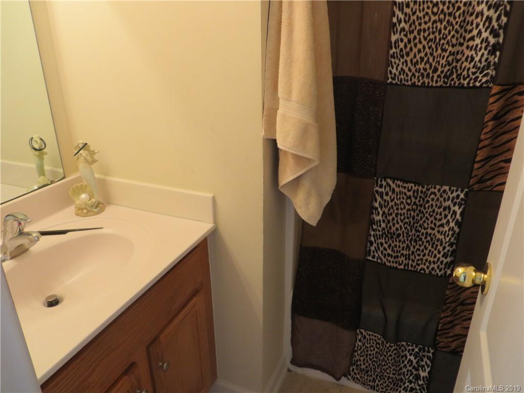 12315 Cross Meadow Road Huntersville, NC 28078 - Photo 9 of 12 a bathroom with a sink and a mirror