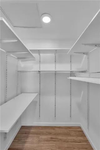 a view of an empty walk in closet