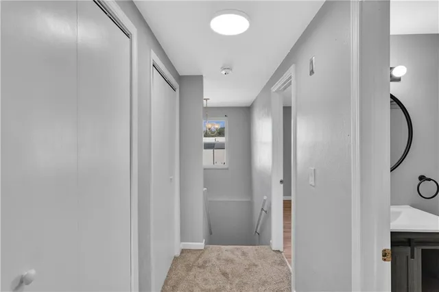 a view of livingroom with hardwood floor and a ceiling fan